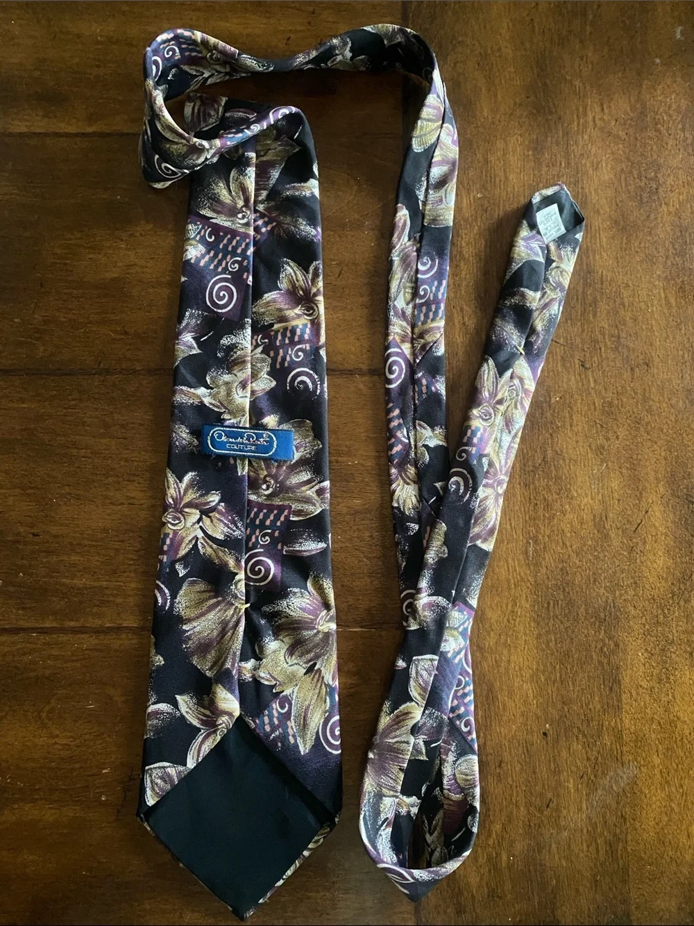 Oscar de la Renta 100% silk Black Tie with Gold and Purple Floral Motif